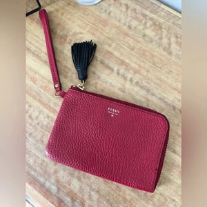 EUC Fossil Red Leather with Black Tassel Wristlet